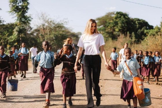Walking our amazing students home after the classes. Putting a smile on these kids' faces meant the world to me. Being a part of something as meaningful as giving these little angels hope for a joyful day and a b.jpg